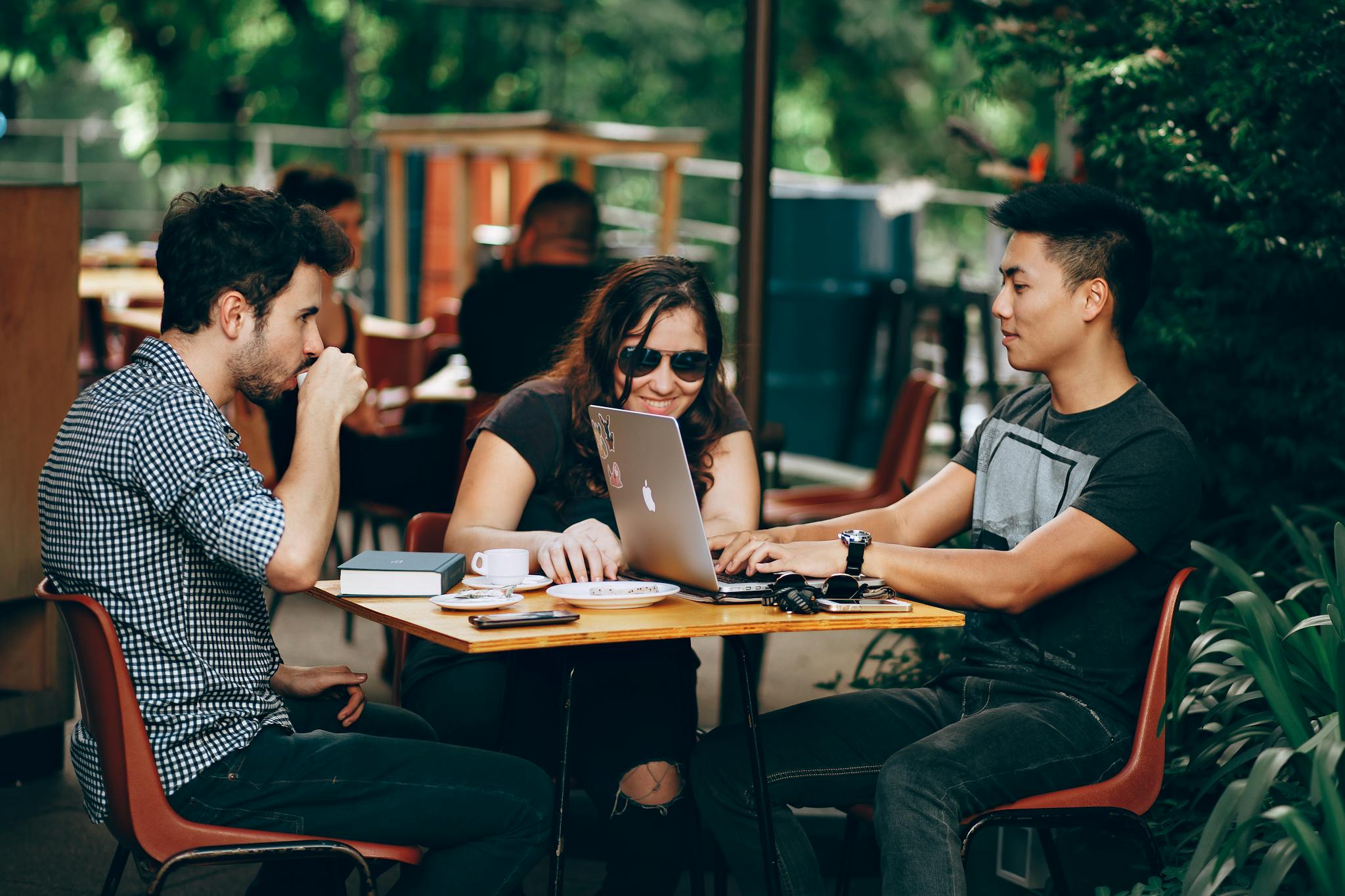 a group of young adults working on